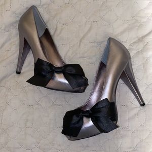 Paris Hilton “Silver Glam Heels with Black Bow”